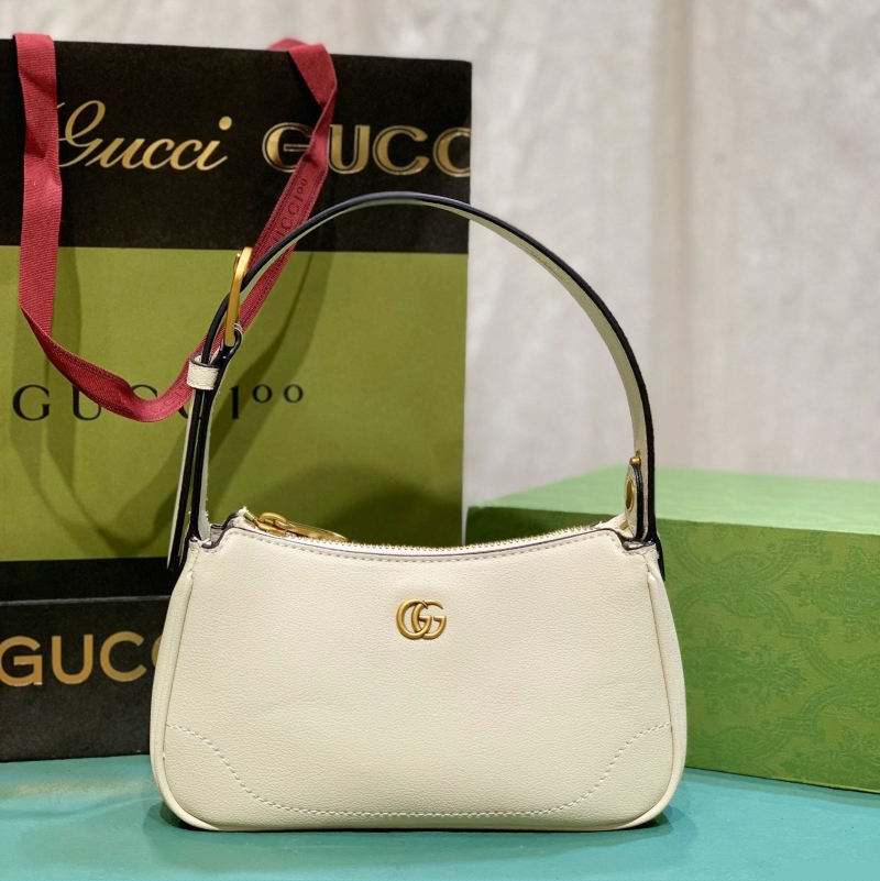G*u*i top handle bags